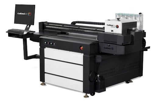 Large format flatbed UV printer with monitor and white storage drawers on black base